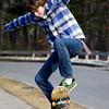 3/1/09 Flying High

With a nice day yesterday, the boys in the neighborhood were out on their boards.  This  is one of my sons friends going off a jump.